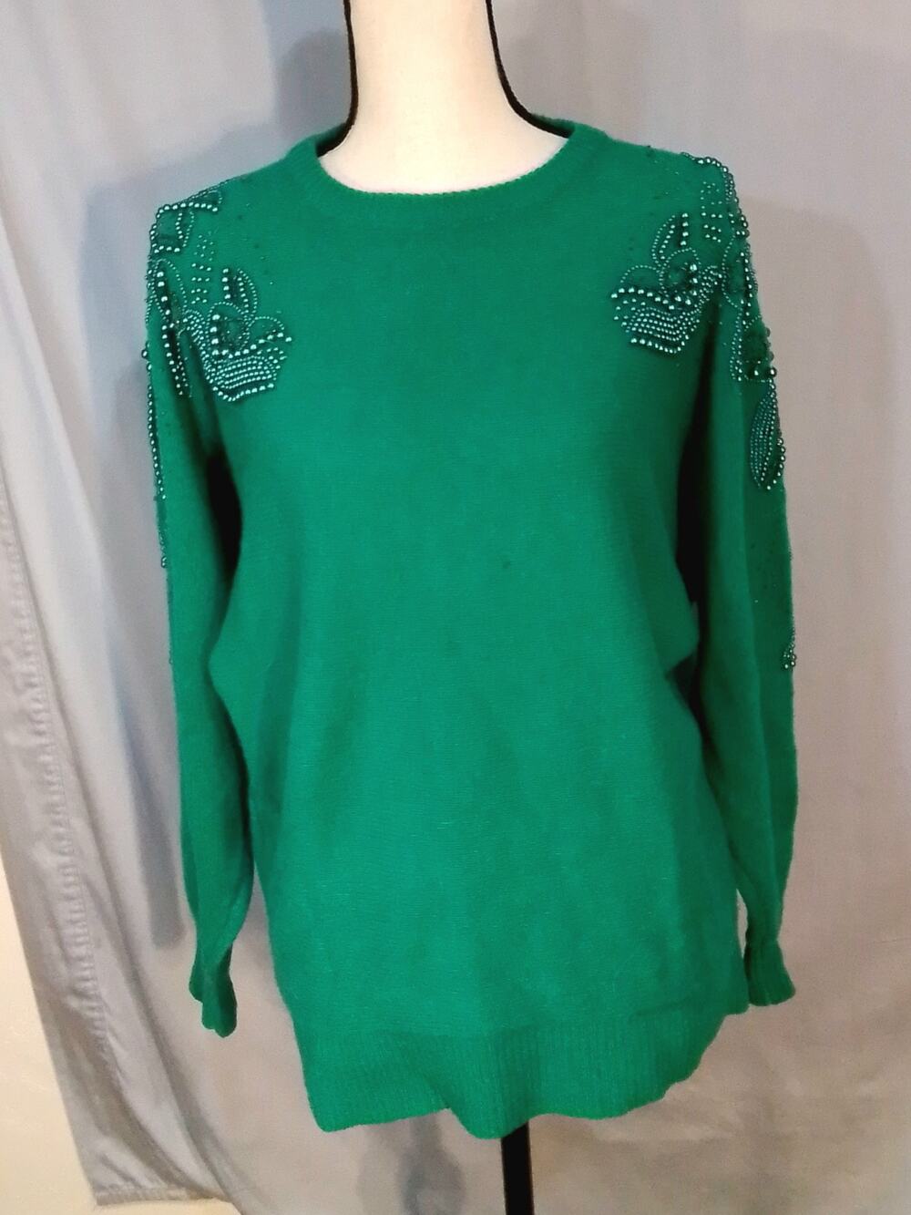 Green beaded sweater